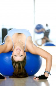 3993827_l _woman_bending_backwards_over_pilates_ball